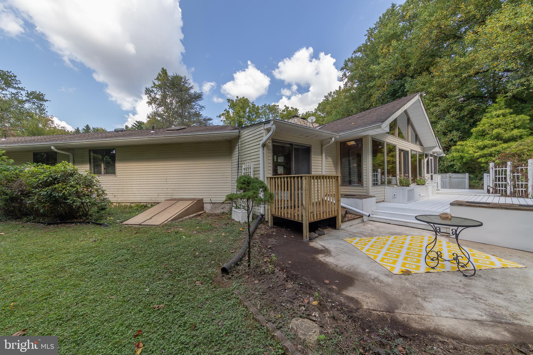 424 Greentree Road Sewell, NJ 08080 - Photo 36 of 54 Patio off Primary Suite & Bilco Doors to Basement