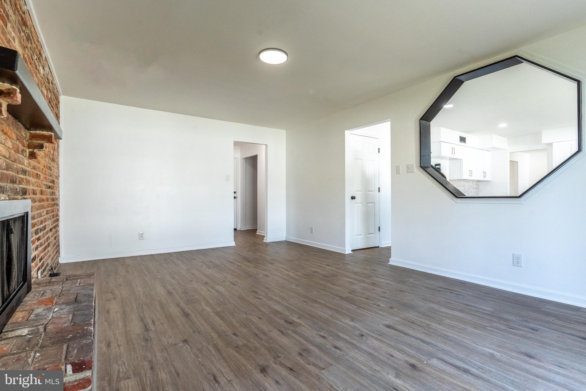 5 Ramsgate Road Cherry Hill, NJ 08003 - Photo 13 of 35 an empty room with wooden floor and mirror