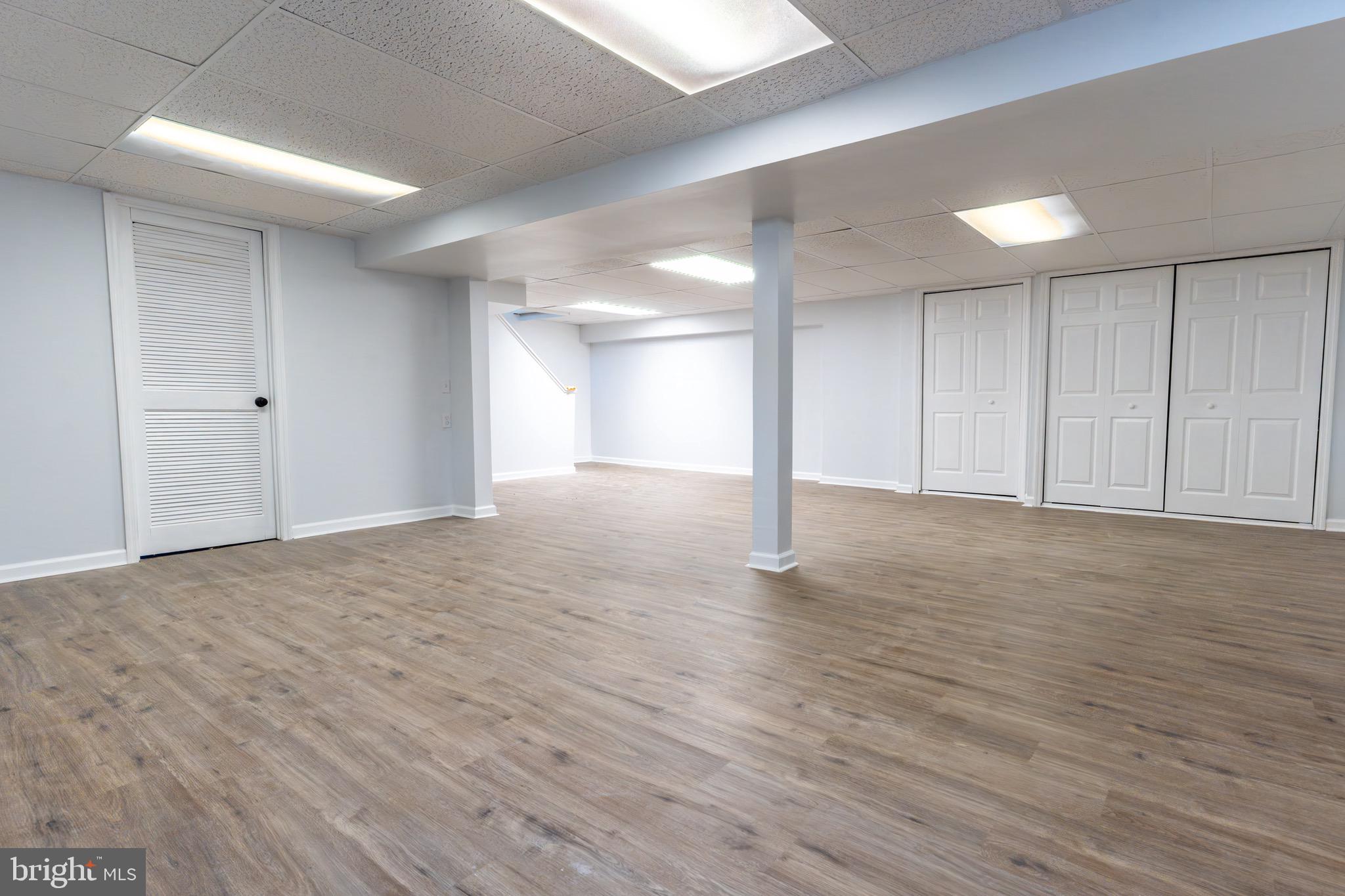 5 Ramsgate Road Cherry Hill, NJ 08003 - Photo 32 of 35 a view of an empty room with wooden floor