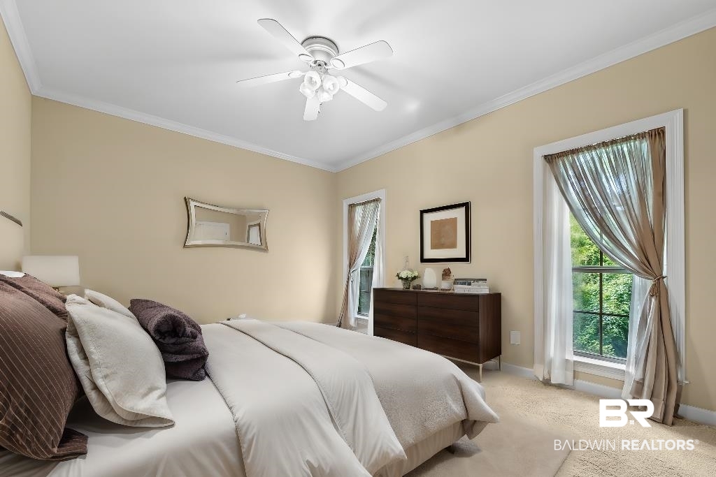 29976 Dolive Ridge Daphne, AL 36527 - Photo 41 of 58 Carpeted bedroom with crown molding and ceiling fan