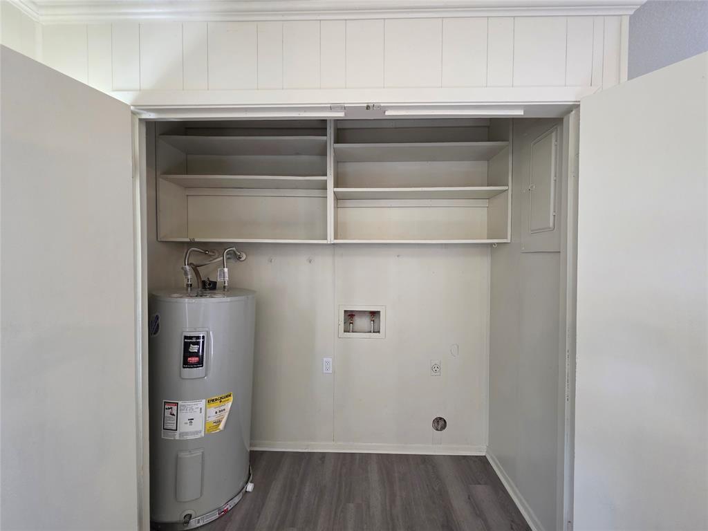 406 East Brazos Street Groesbeck, TX 76642 - Photo 23 of 29 a view of walk in closet with empty racks