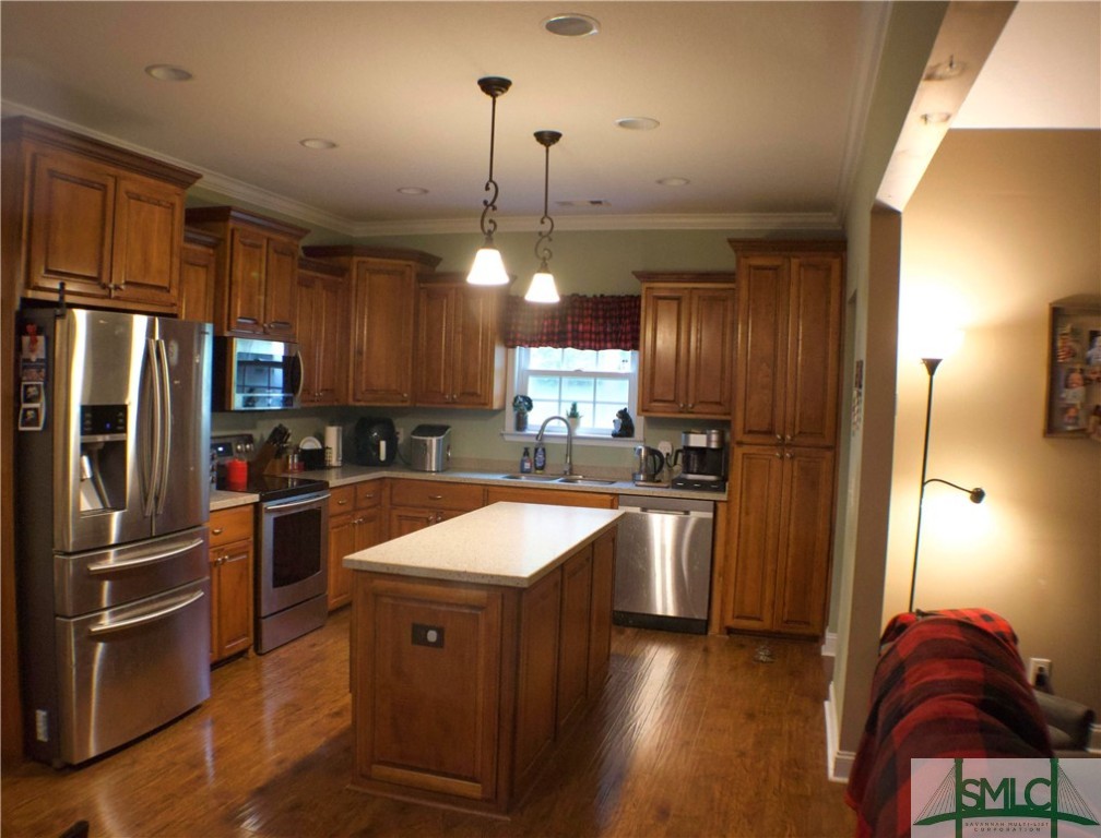 479 Shearouse Road Guyton, GA 31312 - Photo 11 of 32 Island provides breakfast bar and lots of counter