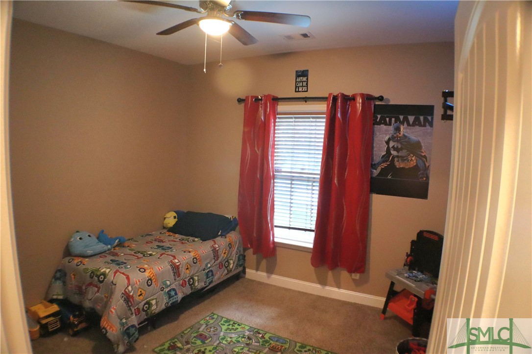 479 Shearouse Road Guyton, GA 31312 - Photo 20 of 32 Bedroom 2 of 3 in Main Home overlooks backyard