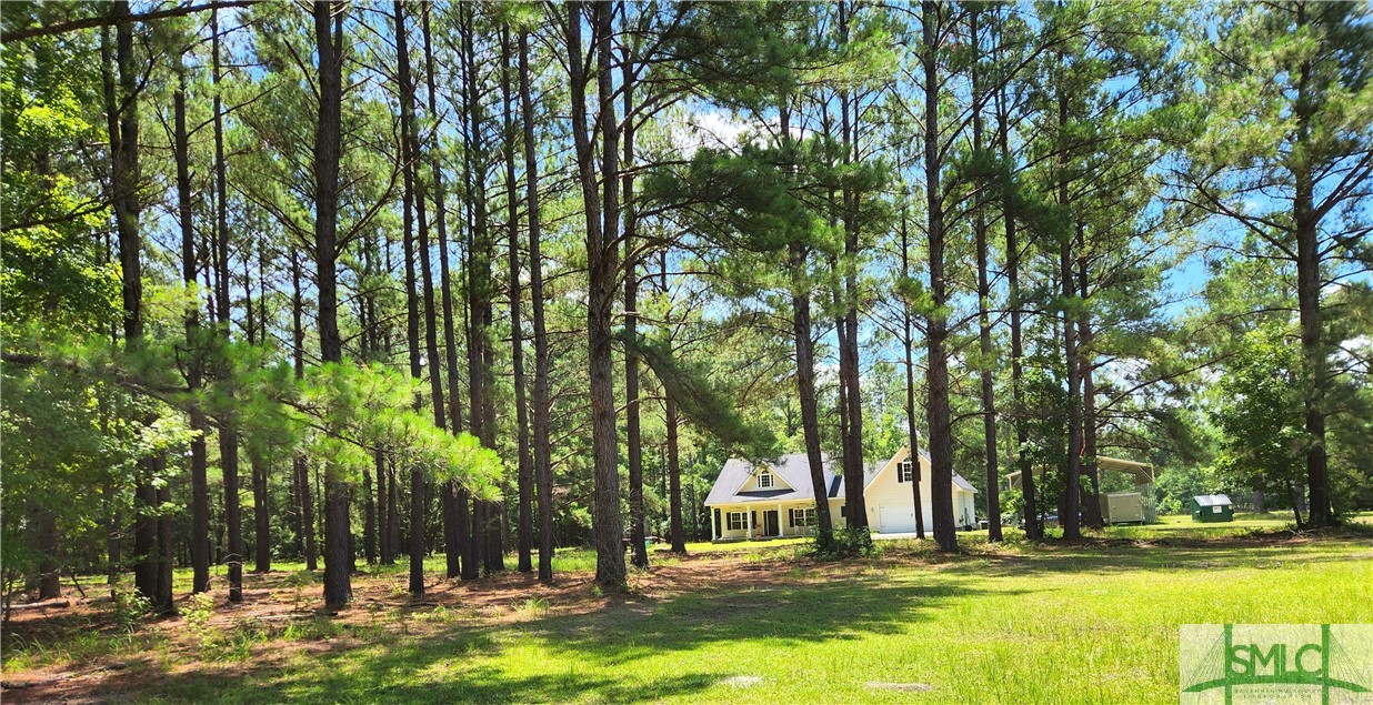 479 Shearouse Road Guyton, GA 31312 - Photo 2 of 32 From front of lot toward homes