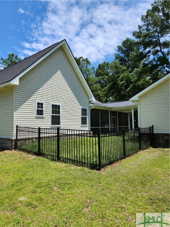 479 Shearouse Road Guyton, GA 31312 - Photo 24 of 32 Gated Area between Inlaw and Main Home