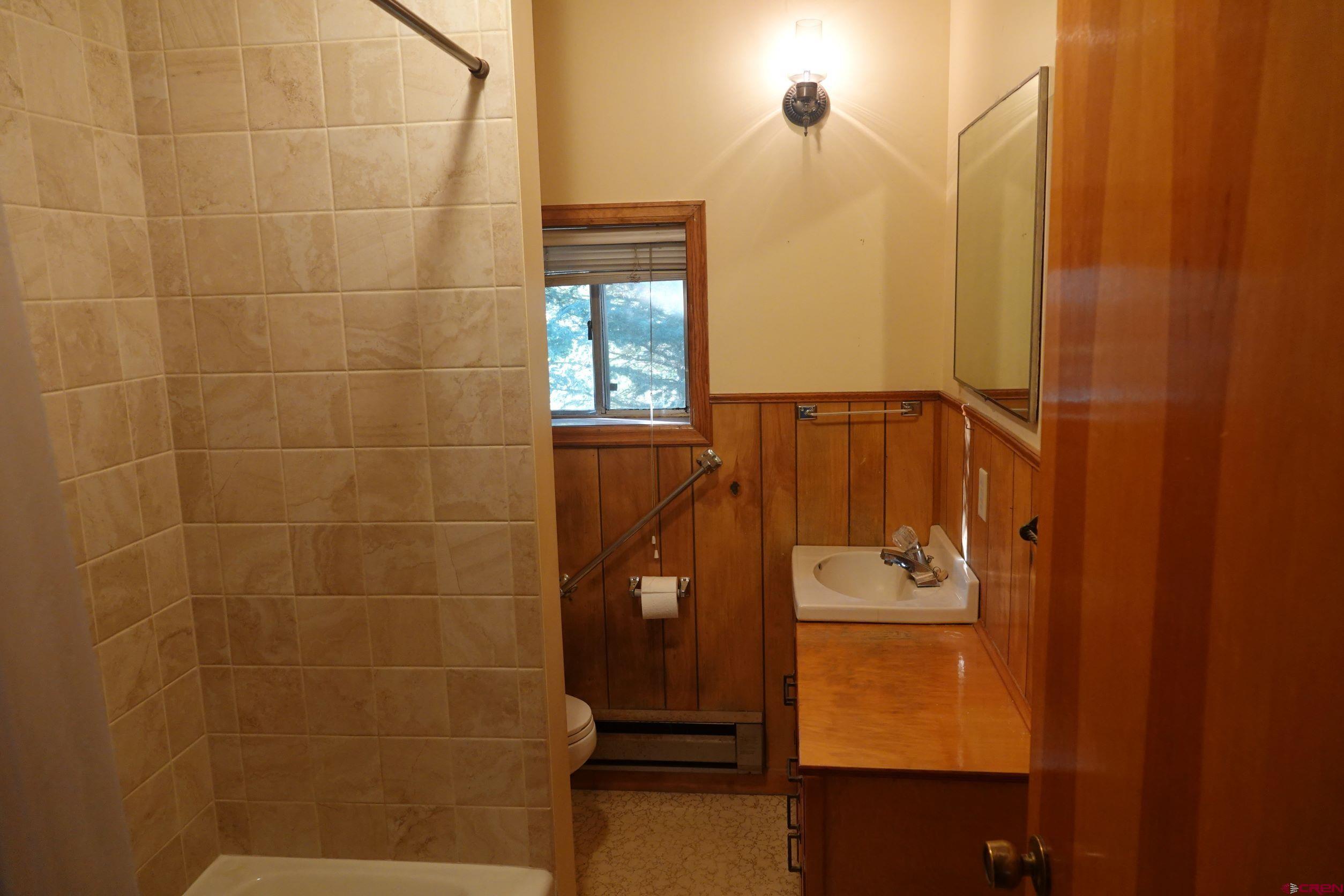 15835 Black Bridge Road Paonia, CO 81428 - Photo 20 of 35 a bathroom with a shower