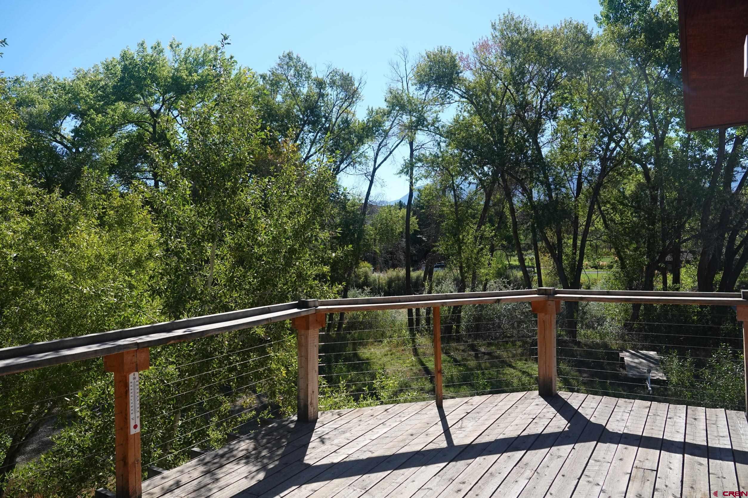 15835 Black Bridge Road Paonia, CO 81428 - Photo 26 of 35 a view of a balcony with an outdoor space