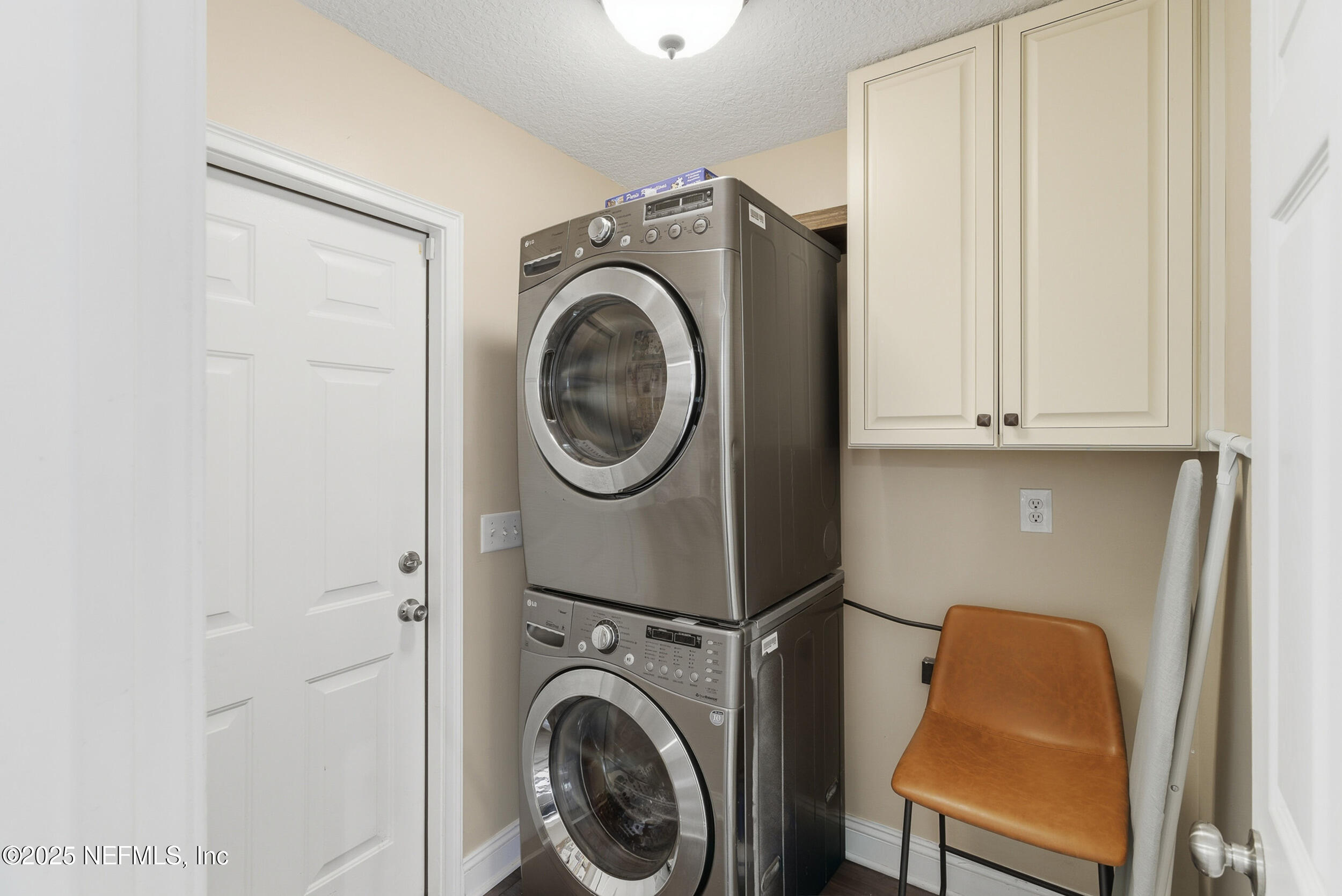 128 Seminole Road, Unit 11 Atlantic Beach, FL 32233 - Photo 16 of 26 a utility room with dryer and washer