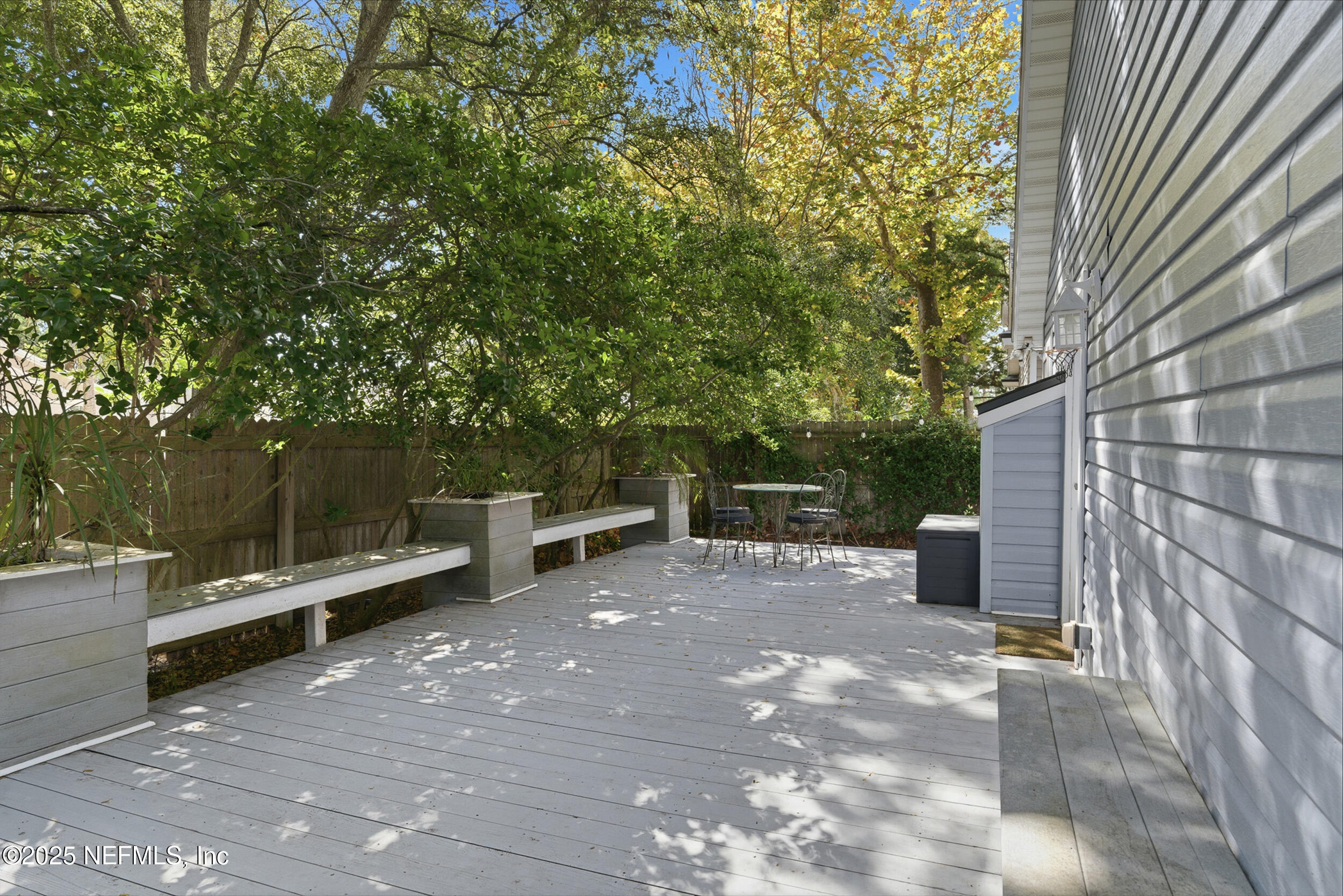 128 Seminole Road, Unit 11 Atlantic Beach, FL 32233 - Photo 17 of 26 a view of backyard with sitting area