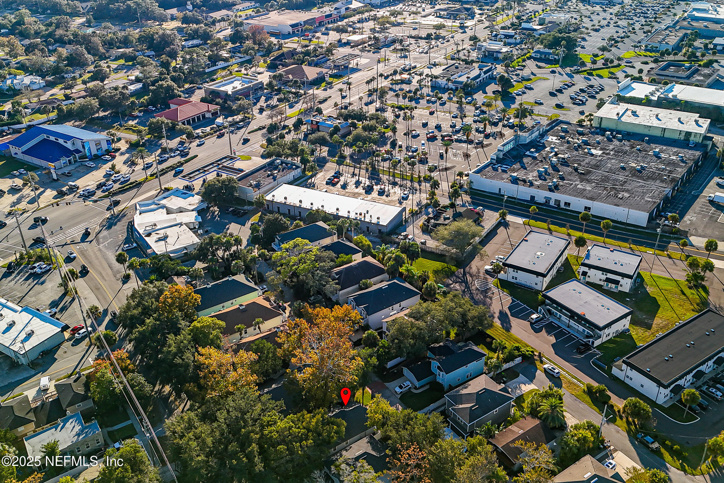 128 Seminole Road, Unit 11 Atlantic Beach, FL 32233 - Photo 23 of 26 an aerial view of multiple houses with yard