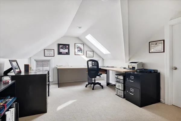 a view of a workspace with furniture