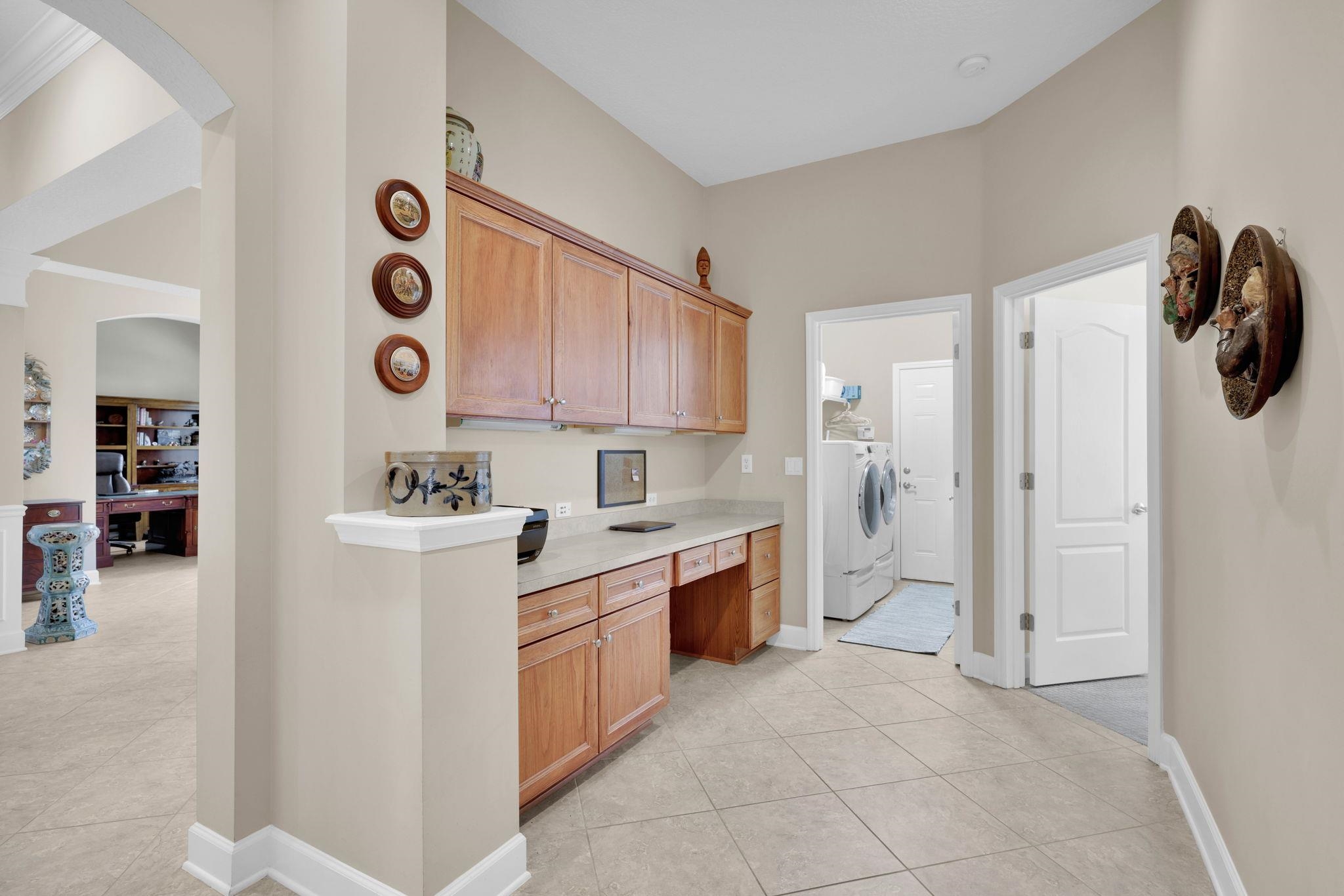 159 La Mesa Drive St. Augustine, FL 32095 - Photo 29 of 85 a kitchen with a refrigerator and a stove top oven