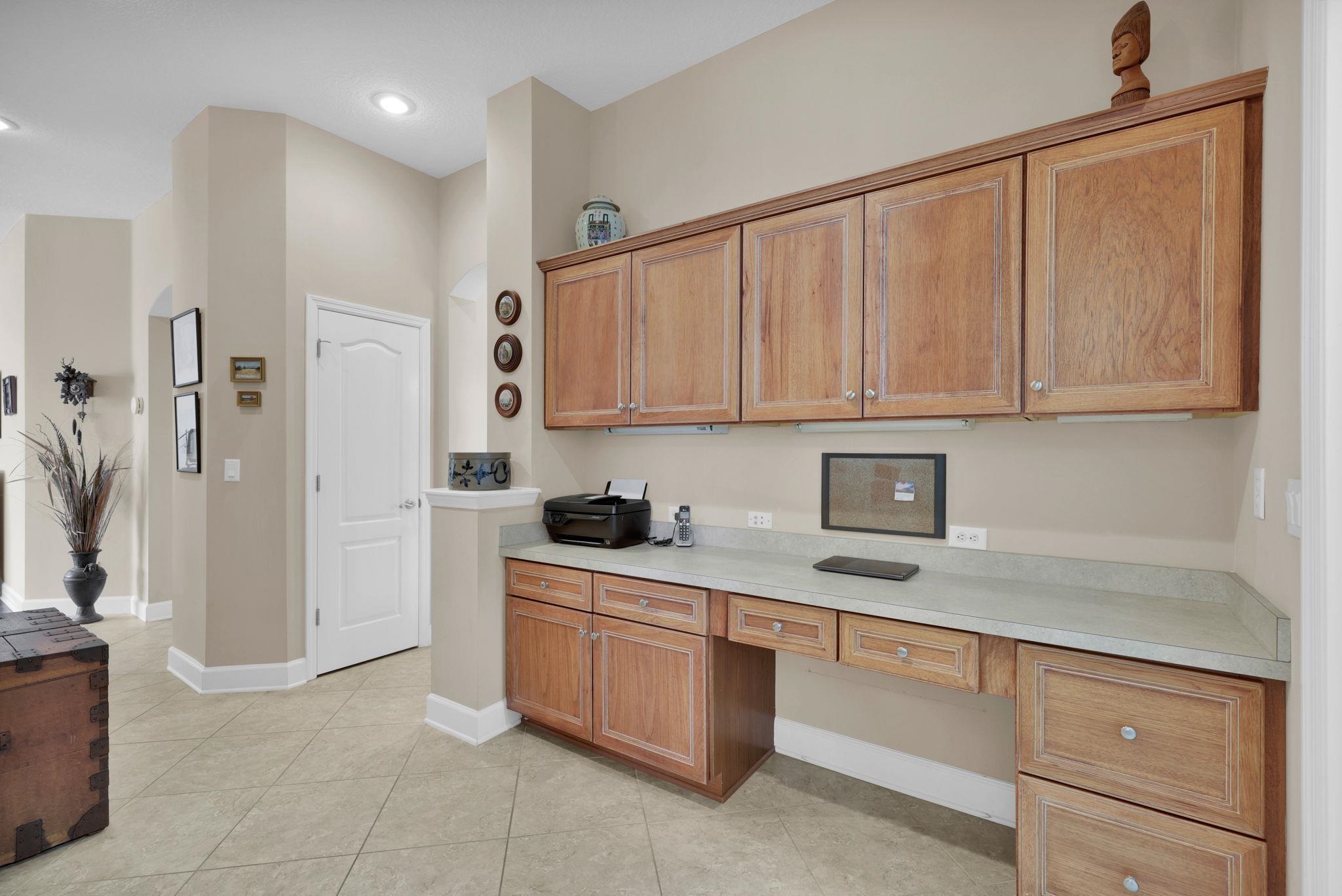 159 La Mesa Drive St. Augustine, FL 32095 - Photo 30 of 85 a kitchen with stainless steel appliances granite countertop a refrigerator and a sink