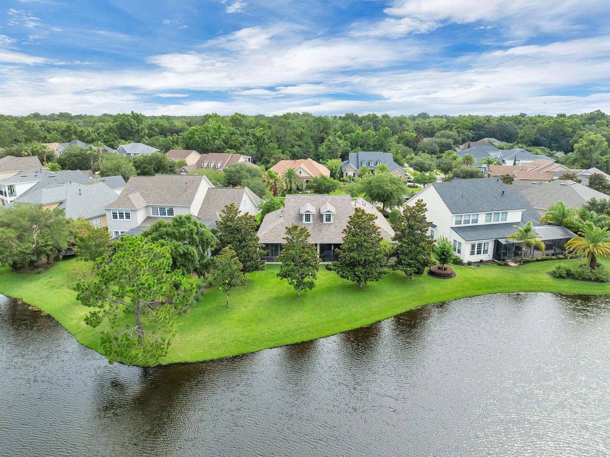159 La Mesa Drive St. Augustine, FL 32095 - Photo 52 of 85 an aerial view of a house with yard swimming pool and lake view
