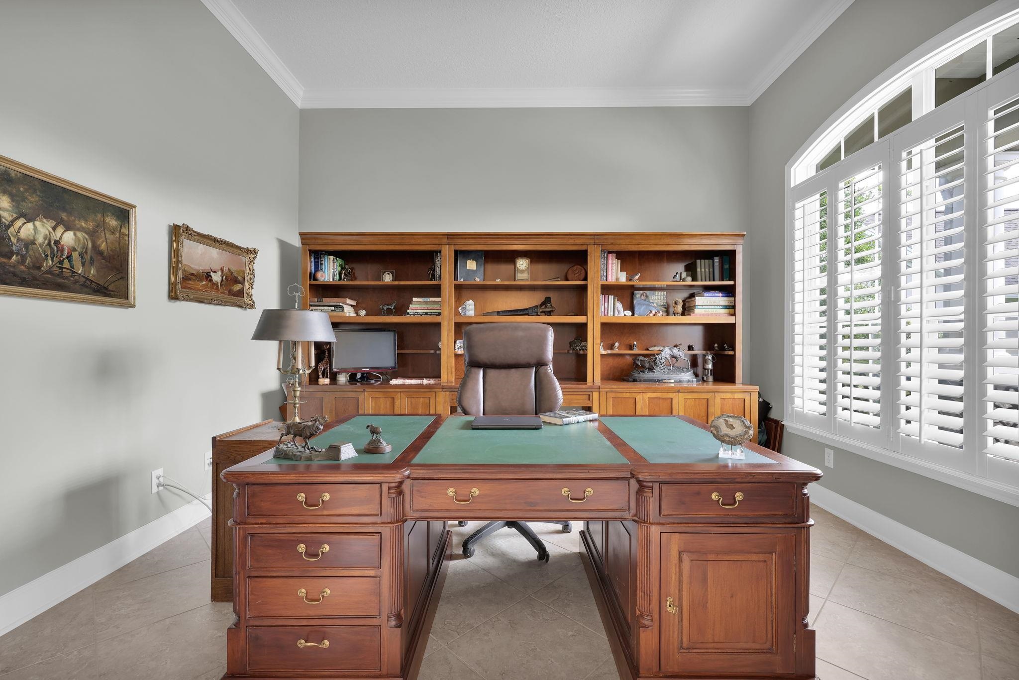 159 La Mesa Drive St. Augustine, FL 32095 - Photo 7 of 85 a room with furniture and book shelf