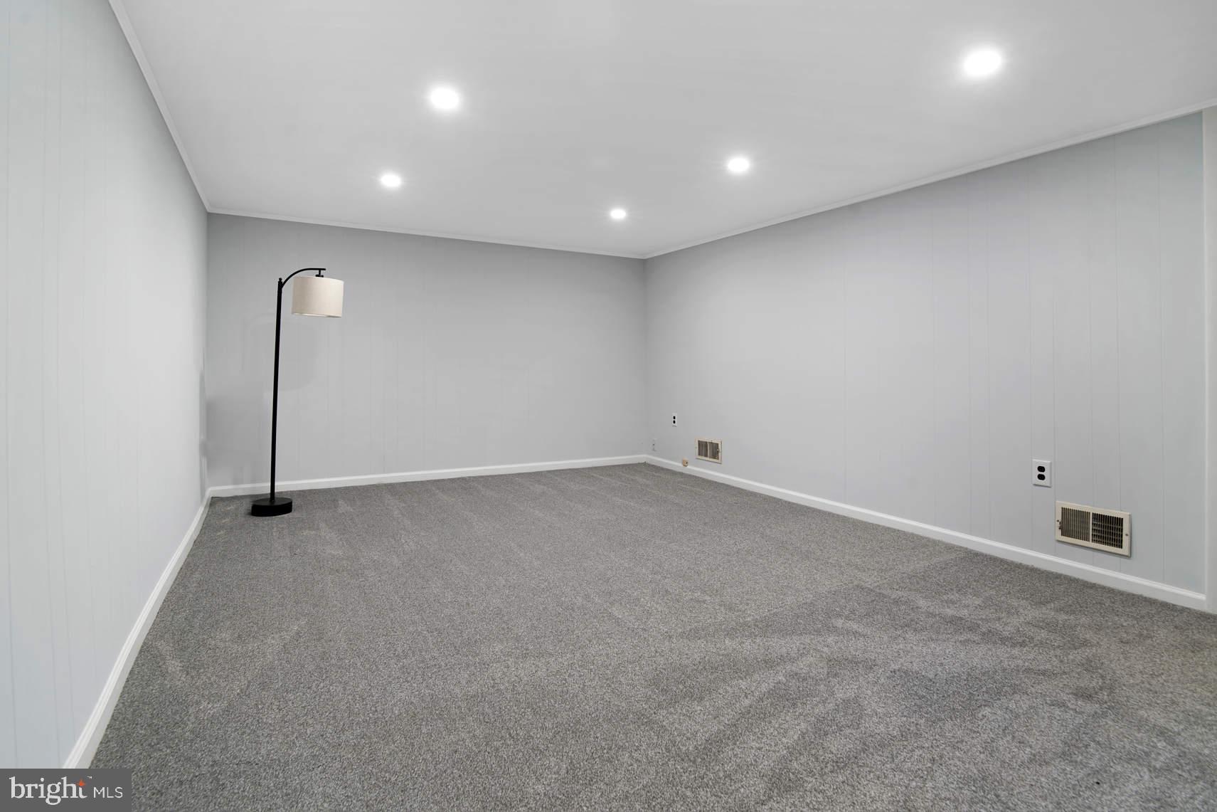 510 Bonifant Street Silver Spring, MD 20910 - Photo 14 of 16 Rec room with recessed lights & new carpet