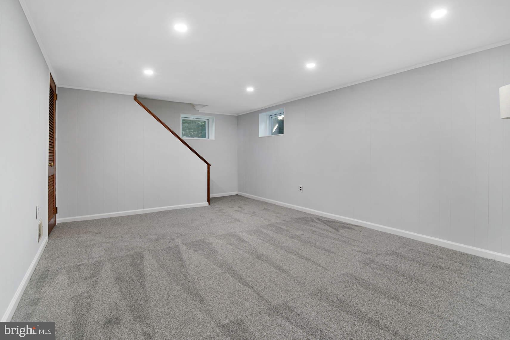 510 Bonifant Street Silver Spring, MD 20910 - Photo 15 of 16 Rec room with recessed lights and new carpet