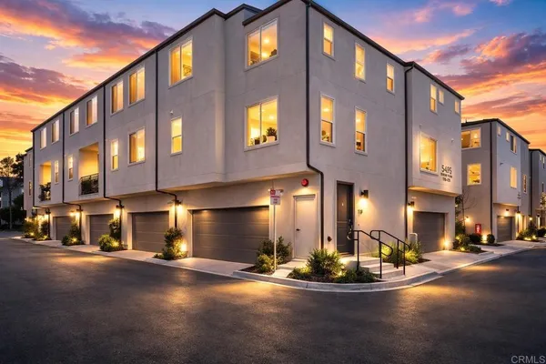 a front view of a building with street view
