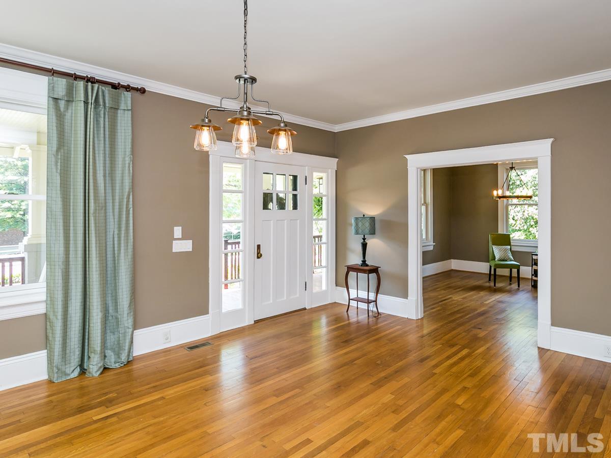 1614 Scales Street Raleigh, NC 27608 - Photo 5 of 25 a view of a livingroom with wooden floor