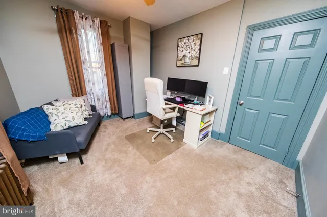 a view of entryway with lots of stuff and toys