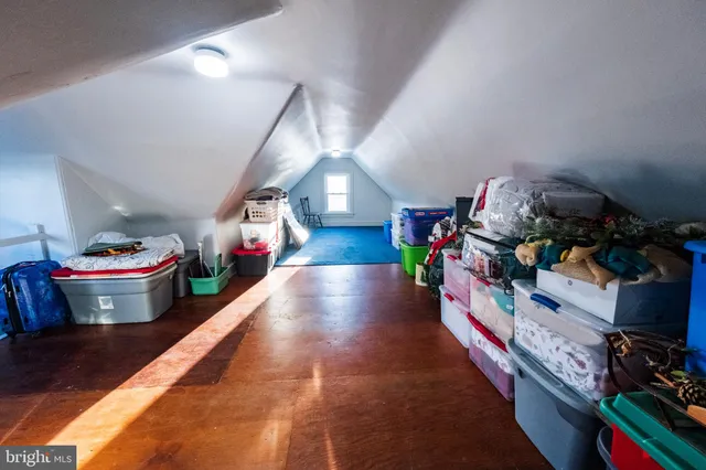 a bed room with a bed and a couch