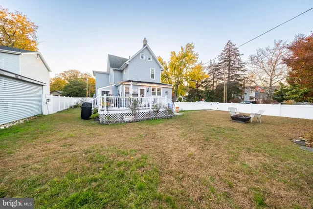 a view of a backyard of the house