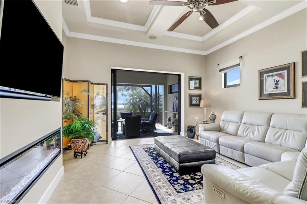 20131 Corkscrew Shores Boulevard Estero, FL 33928 - Photo 4 of 47 a living room with furniture and a large window
