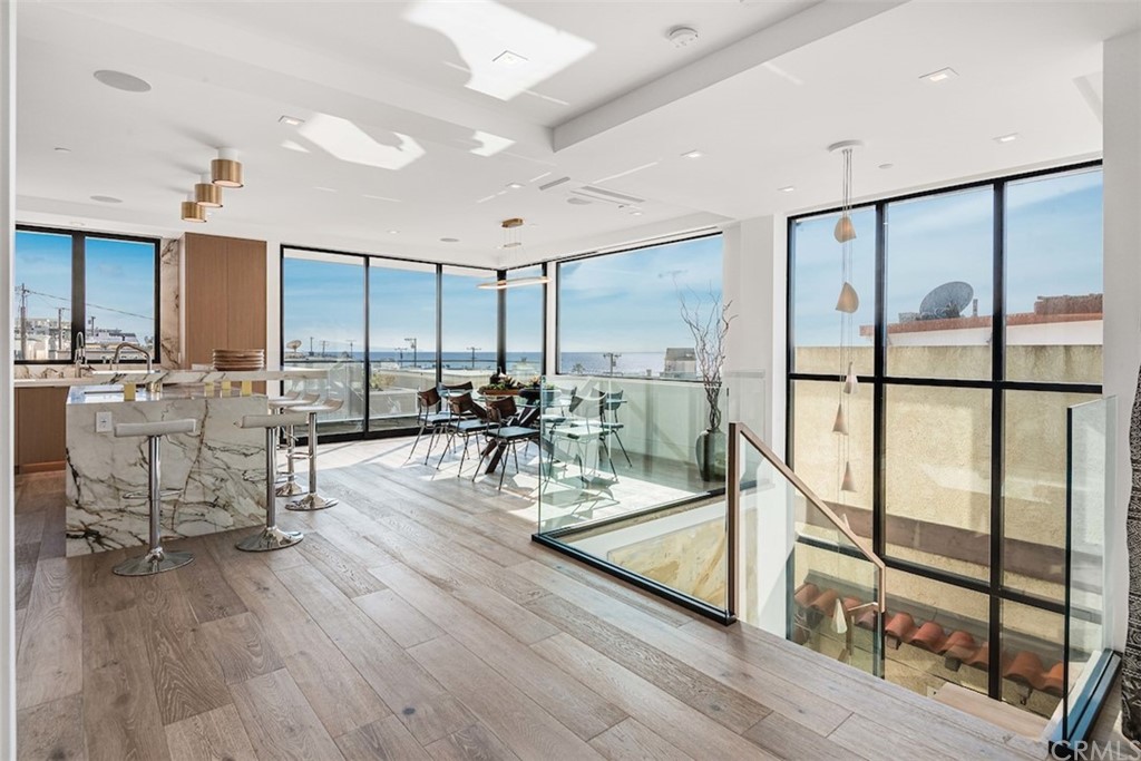 200 40th Street Manhattan Beach, CA 90266 - Photo 25 of 57 a outdoor space with lots of furniture and lots of table