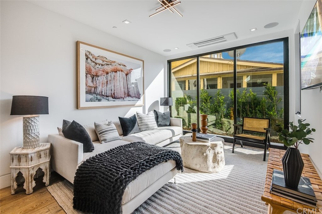 200 40th Street Manhattan Beach, CA 90266 - Photo 38 of 57 a bedroom with furniture and a large window