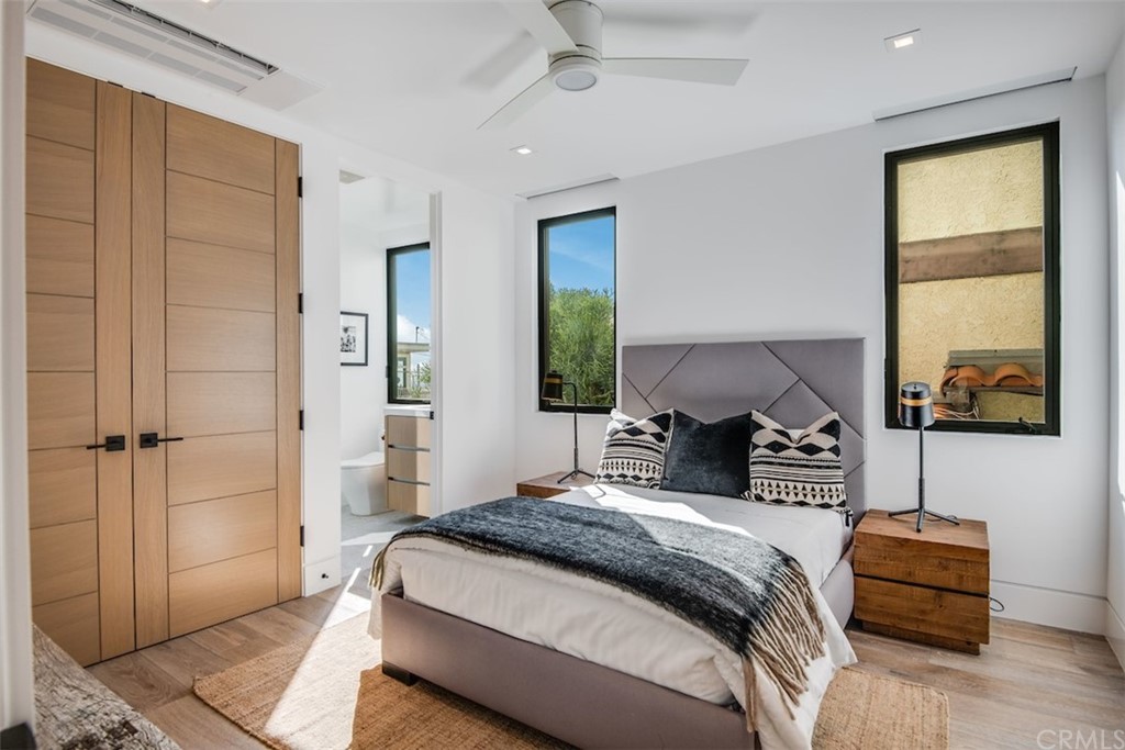 200 40th Street Manhattan Beach, CA 90266 - Photo 44 of 57 a bedroom with a large bed and a window