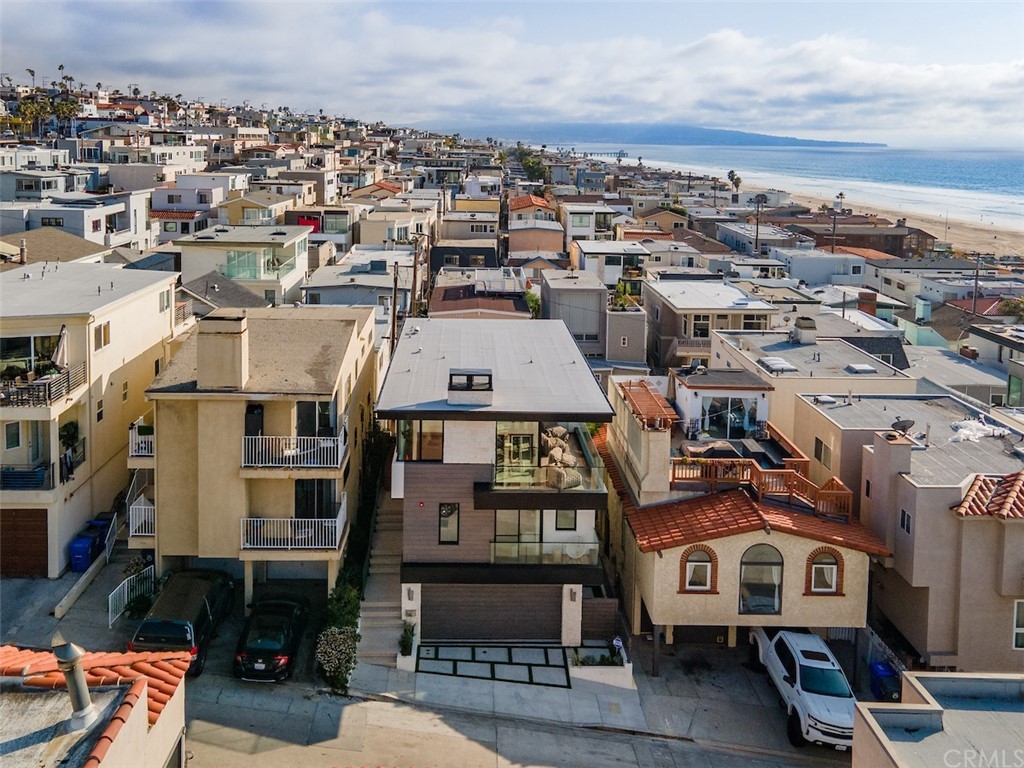200 40th Street Manhattan Beach, CA 90266 - Photo 5 of 57 an aerial view of a house with a yard garage and mountain view in back