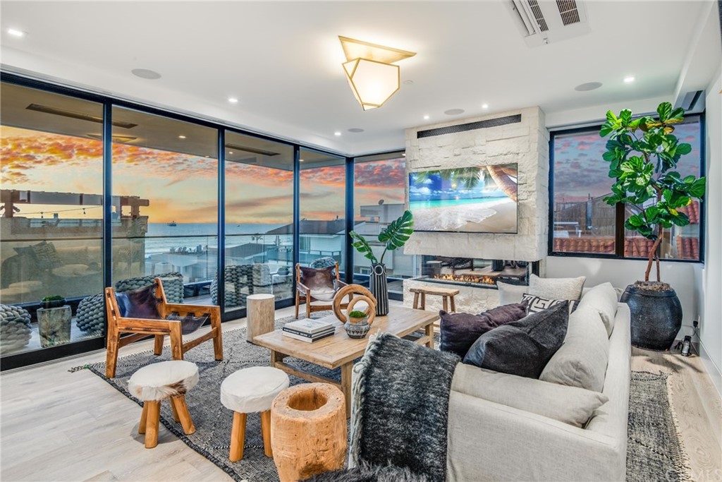200 40th Street Manhattan Beach, CA 90266 - Photo 53 of 57 a living room with furniture and a large window