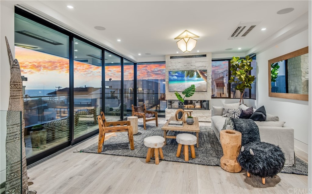 200 40th Street Manhattan Beach, CA 90266 - Photo 54 of 57 a very nice looking living room with furniture and a large window