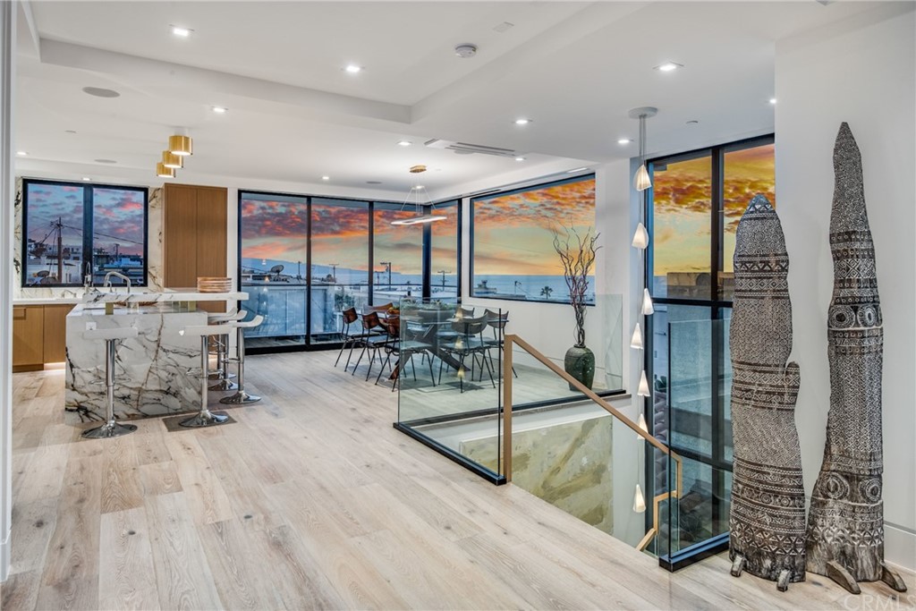 200 40th Street Manhattan Beach, CA 90266 - Photo 56 of 57 a view of a room with gym equipment and large windows