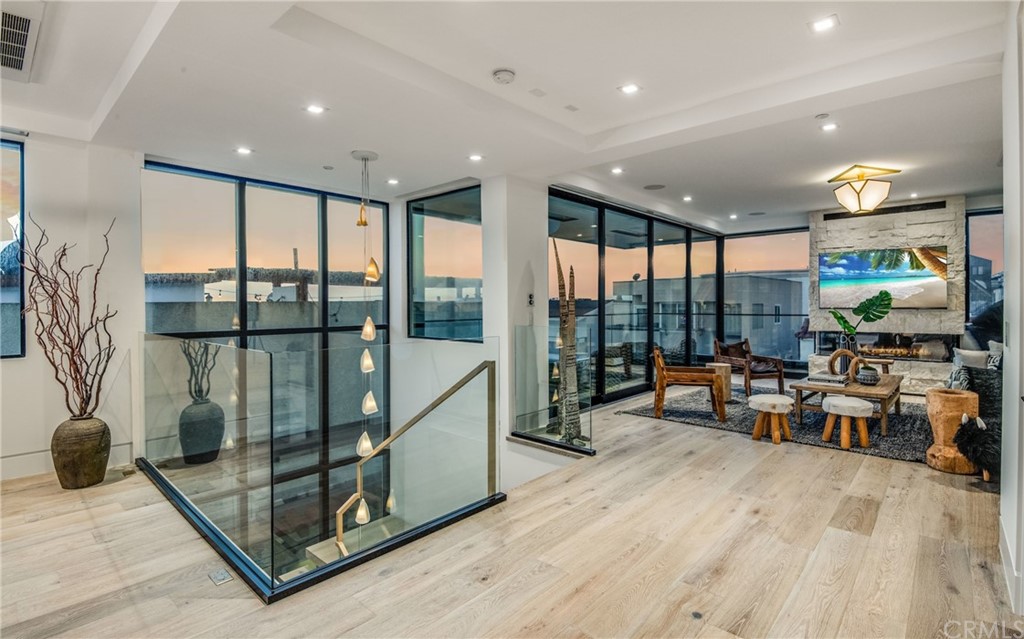 200 40th Street Manhattan Beach, CA 90266 - Photo 57 of 57 a living room with large windows