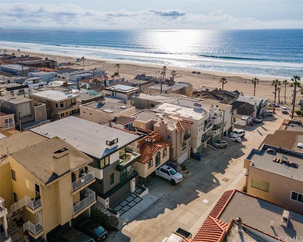 200 40th Street Manhattan Beach, CA 90266 - Photo 7 of 57 an aerial view of a building with parking spaces