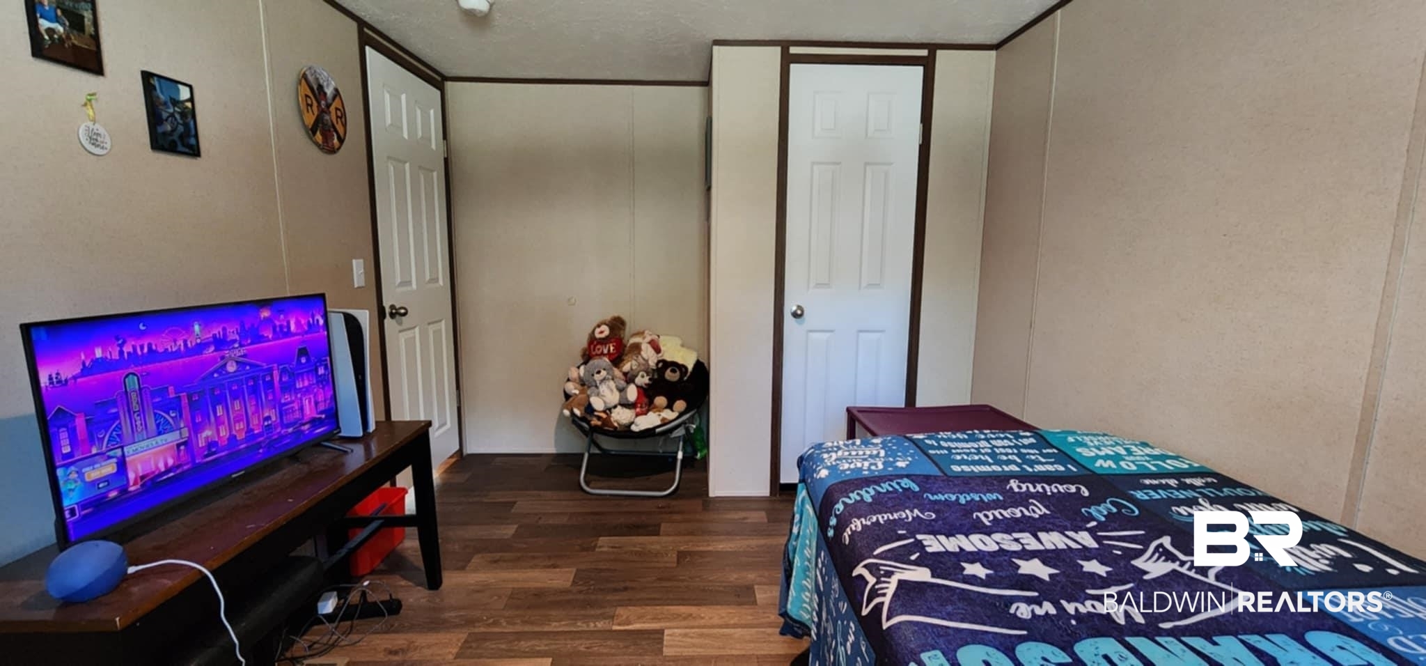 25474 Waterworld Road Robertsdale, AL 36567 - Photo 22 of 30 Bedroom with dark wood-style flooring