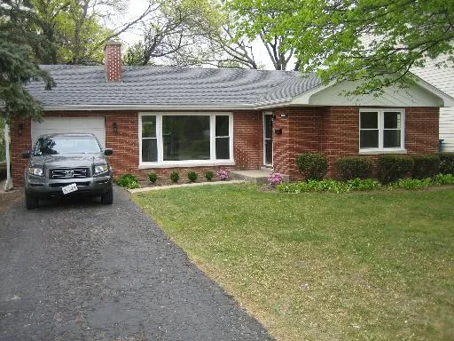 a car parked in front of a house