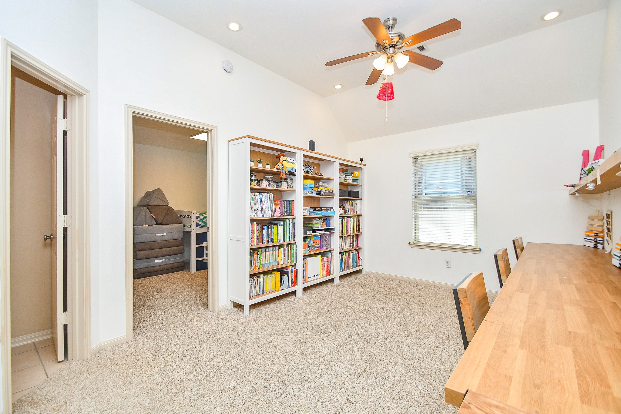 16814 Ranger Ridge Drive Cypress, TX 77429 - Photo 11 of 42 Private study with French doors—ideal for remote work or quiet retreat.