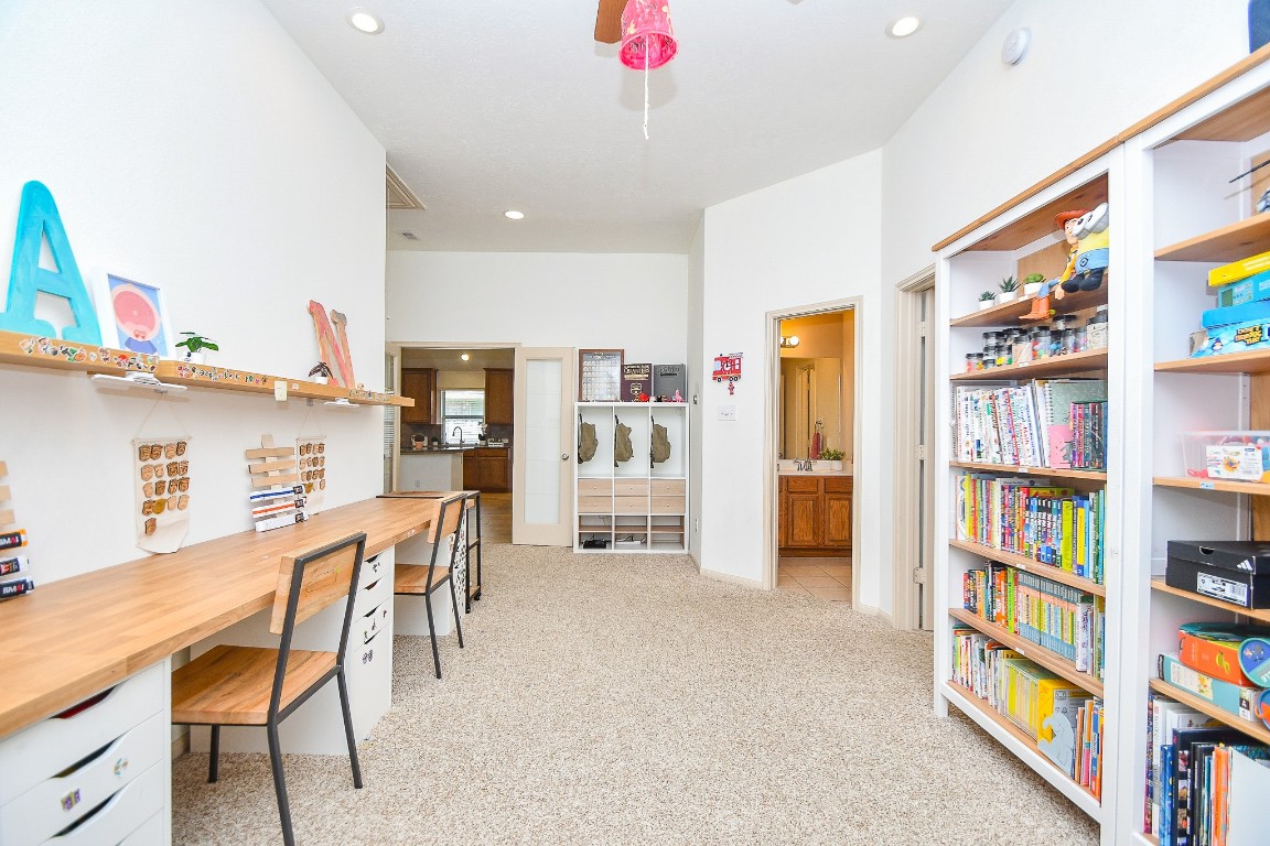 16814 Ranger Ridge Drive Cypress, TX 77429 - Photo 12 of 42 Private study with French doors—ideal for remote work or quiet retreat.