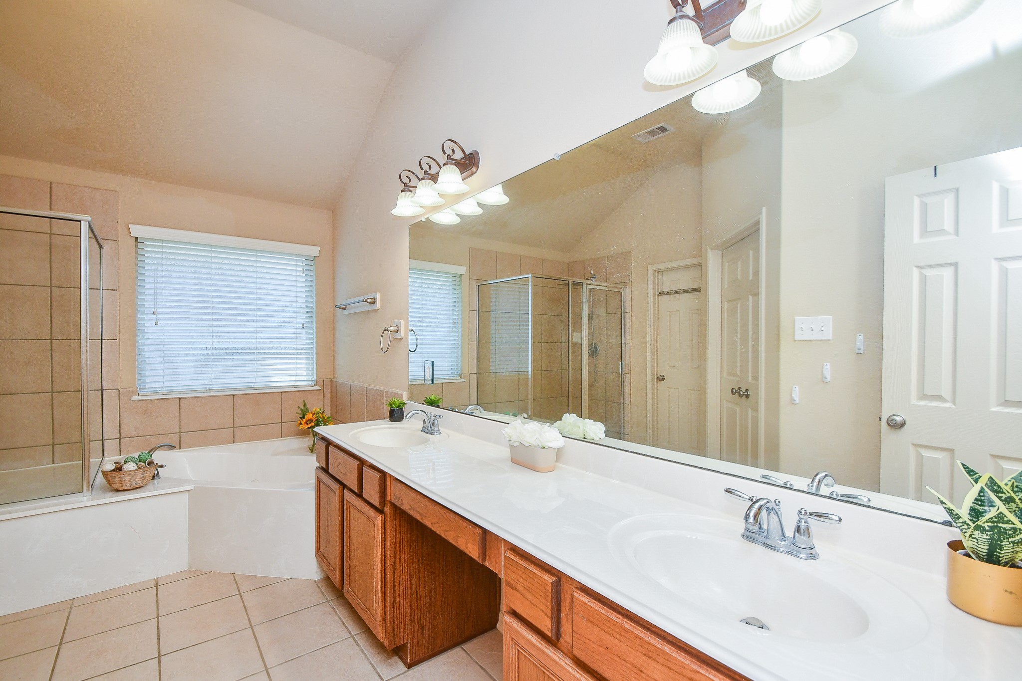 16814 Ranger Ridge Drive Cypress, TX 77429 - Photo 24 of 42 Primary bathroom features a separate shower and jetted tub.