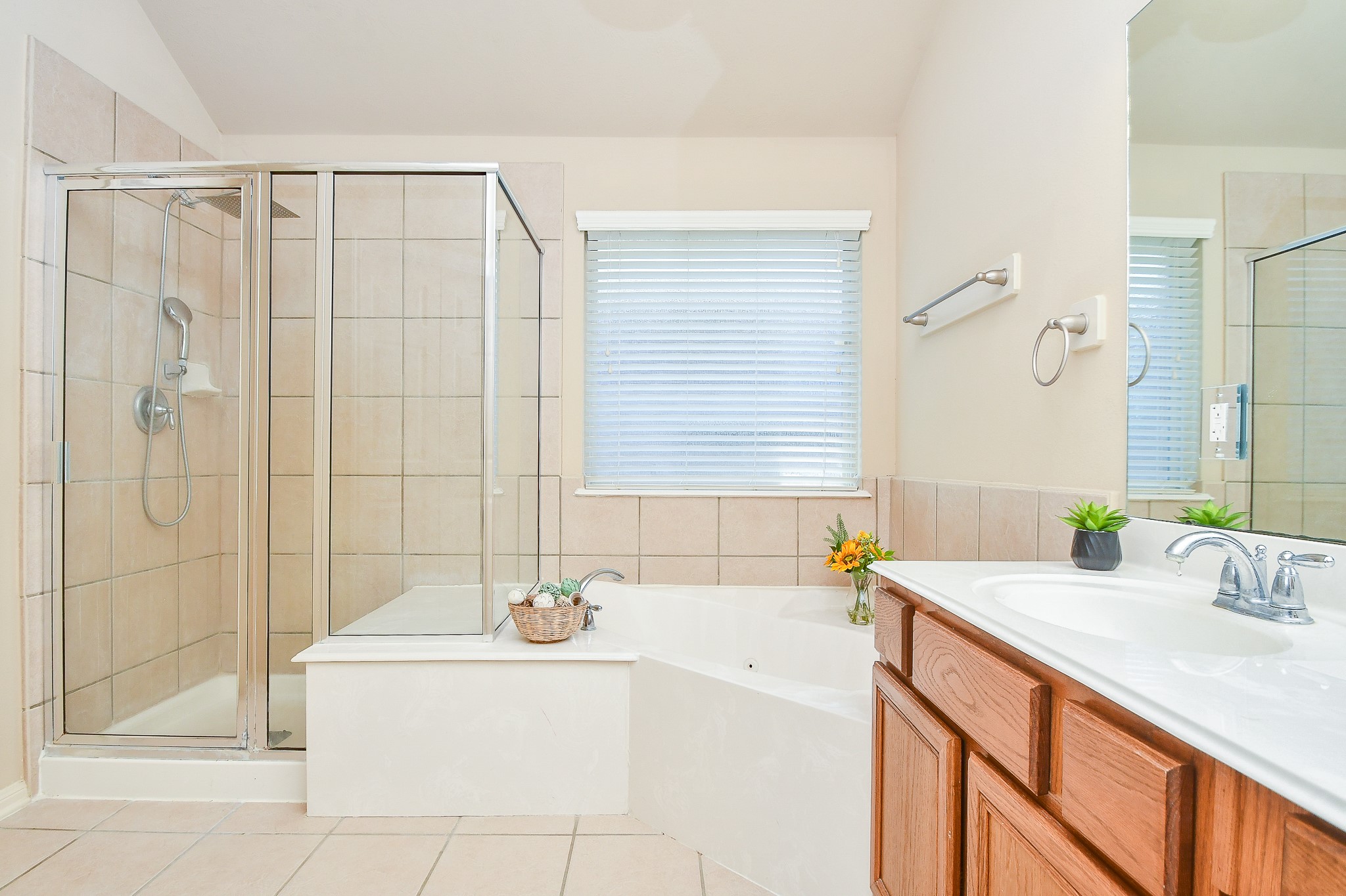 16814 Ranger Ridge Drive Cypress, TX 77429 - Photo 25 of 42 Primary bathroom features a separate shower and jetted tub.