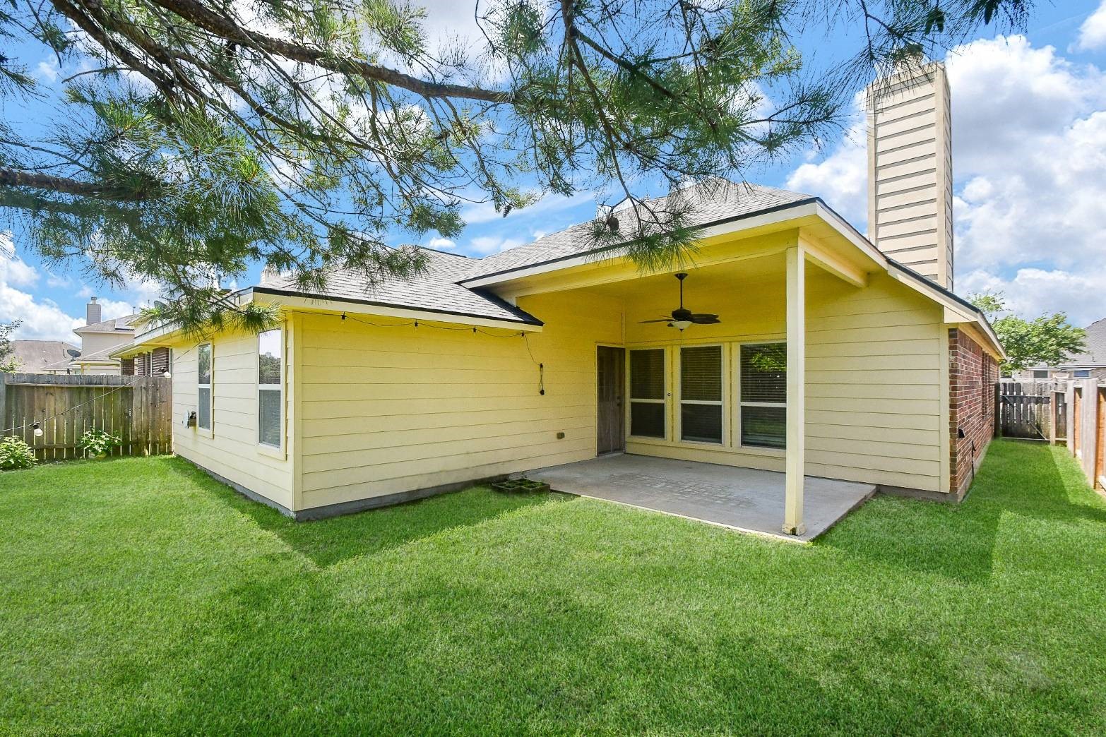 16814 Ranger Ridge Drive Cypress, TX 77429 - Photo 32 of 42 Private backyard with a covered patio, nestled among mature trees and no rear neighbors.