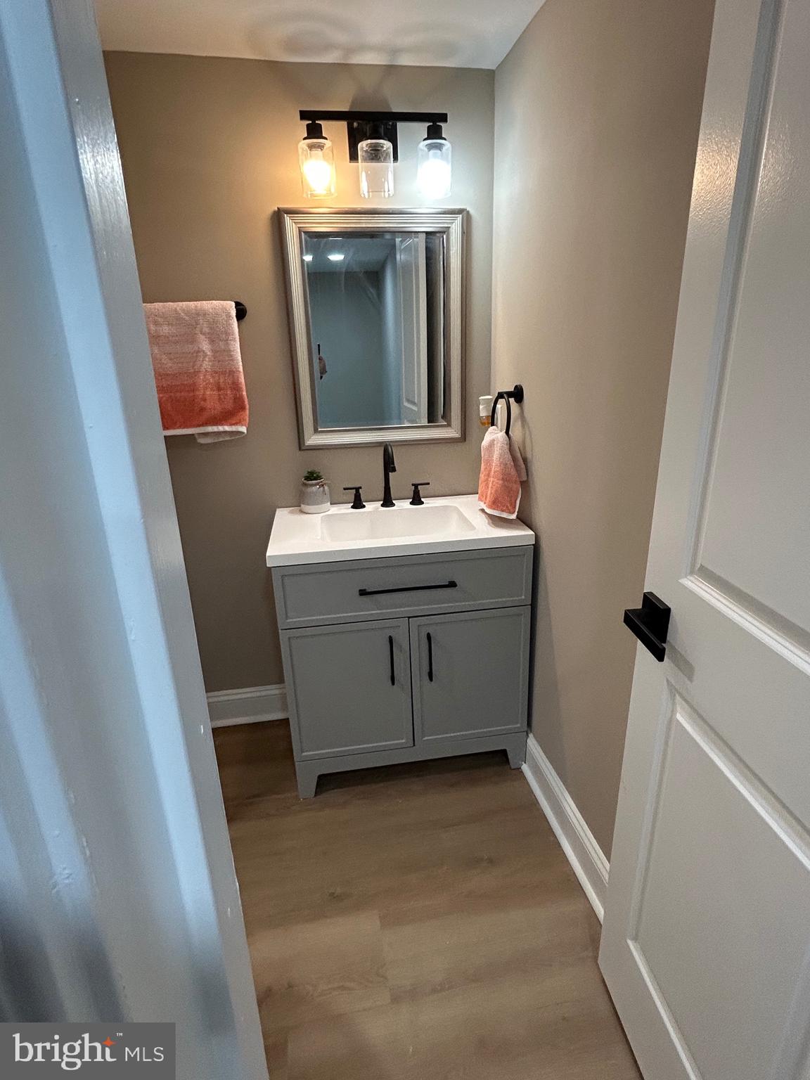 10763 Path Valley Road Fannettsburg, PA 17221 - Photo 16 of 35 a bathroom with a toilet sink and mirror