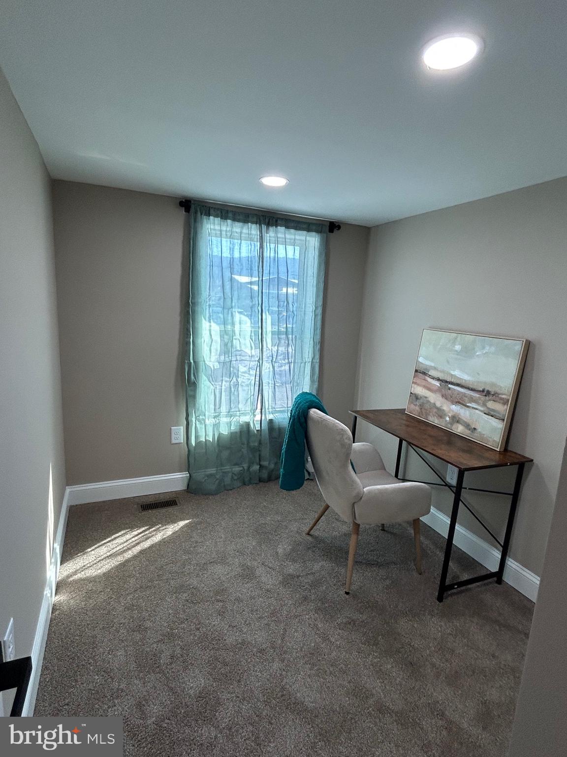 10763 Path Valley Road Fannettsburg, PA 17221 - Photo 17 of 35 a living room with furniture and a window