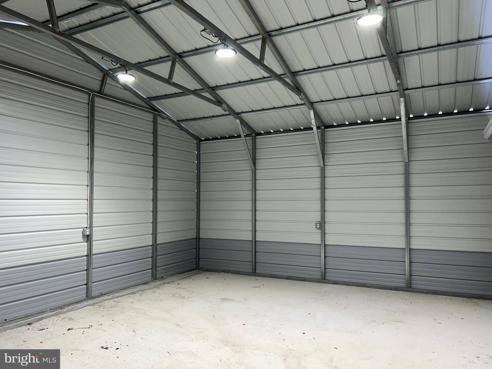 10763 Path Valley Road Fannettsburg, PA 17221 - Photo 26 of 35 a view of a room with racks on the wall