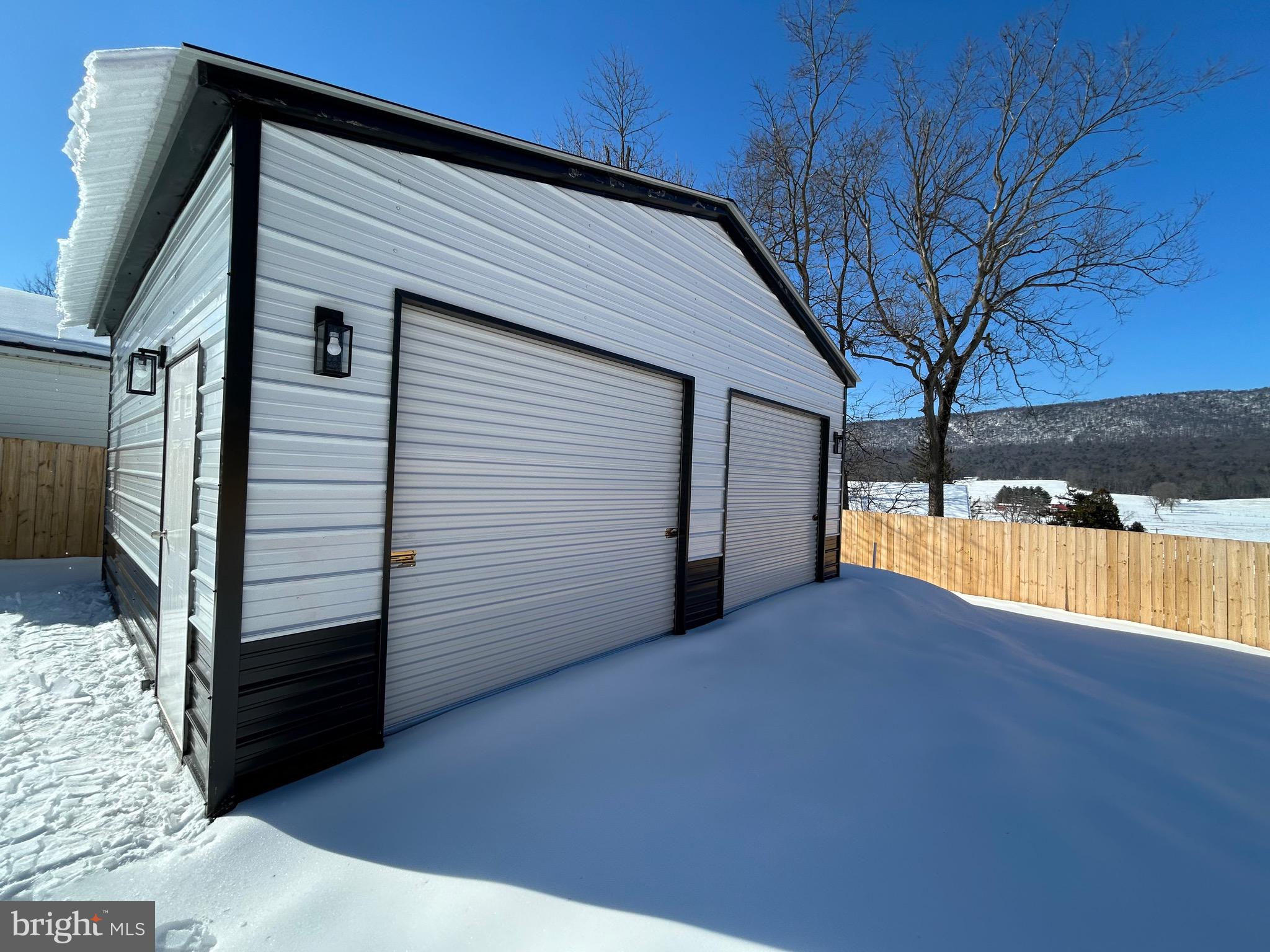 10763 Path Valley Road Fannettsburg, PA 17221 - Photo 27 of 35 a view of a house with a backyard