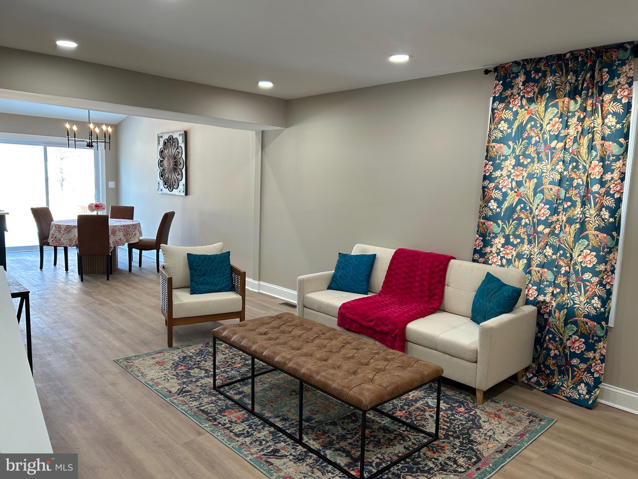 10763 Path Valley Road Fannettsburg, PA 17221 - Photo 3 of 35 a living room with furniture and a potted plant