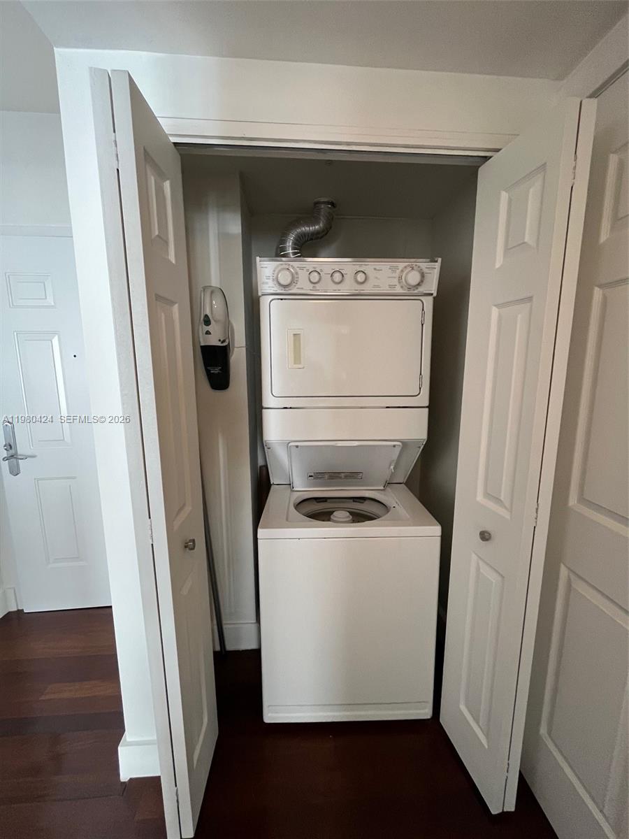 2030 Douglas Road, Unit 610 Coral Gables, FL 33134 - Photo 16 of 19 a utility room with dryer and washer