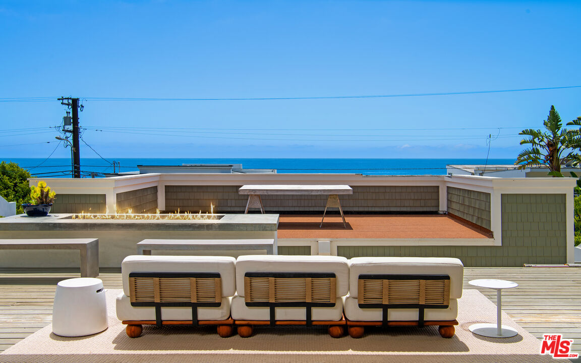 25157 Malibu Road Malibu, CA 90265 - Photo 24 of 33 a view of a two chairs in the balcony